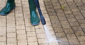 Outdoor floor cleaning with high pressure water jet